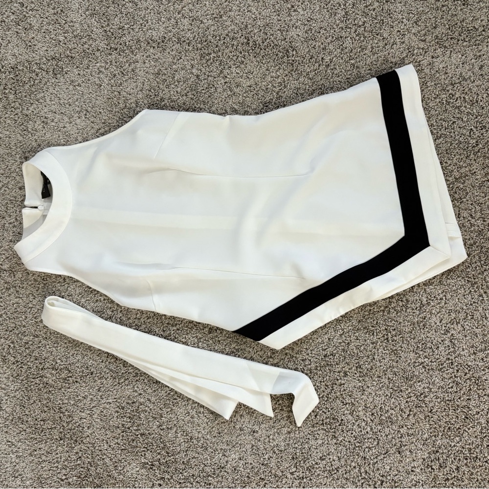 Sleeveless White Shell Top with Black Trim